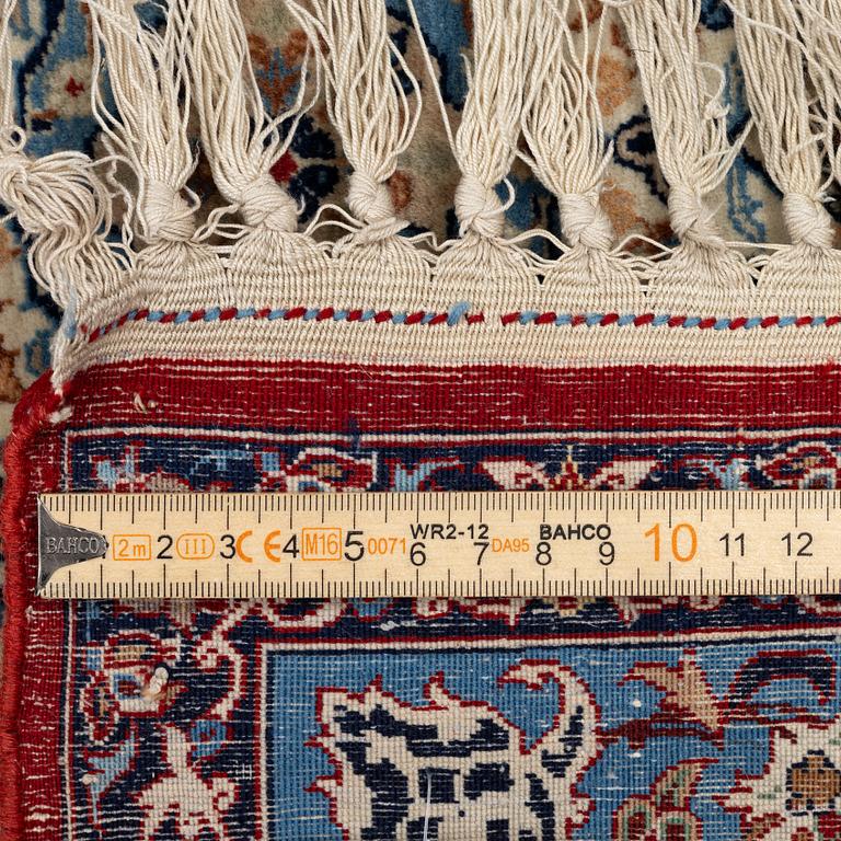 A Isfahan rug, signed (Ali) Seirafian, c. 175 x 109 cm.