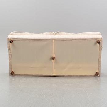 A 'Raffles' sofa designed by Vico Magistretti in 1988 for DePadova.