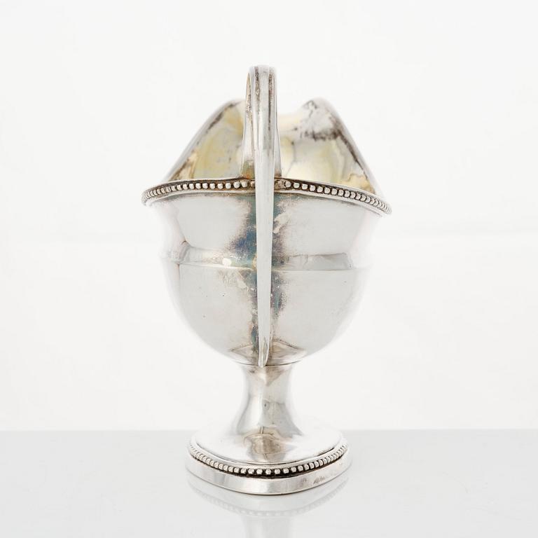 A Swedish Gustavian parcel-gilt silver cream-jug, mark of Petter Eneroth, Stockholm 1786.