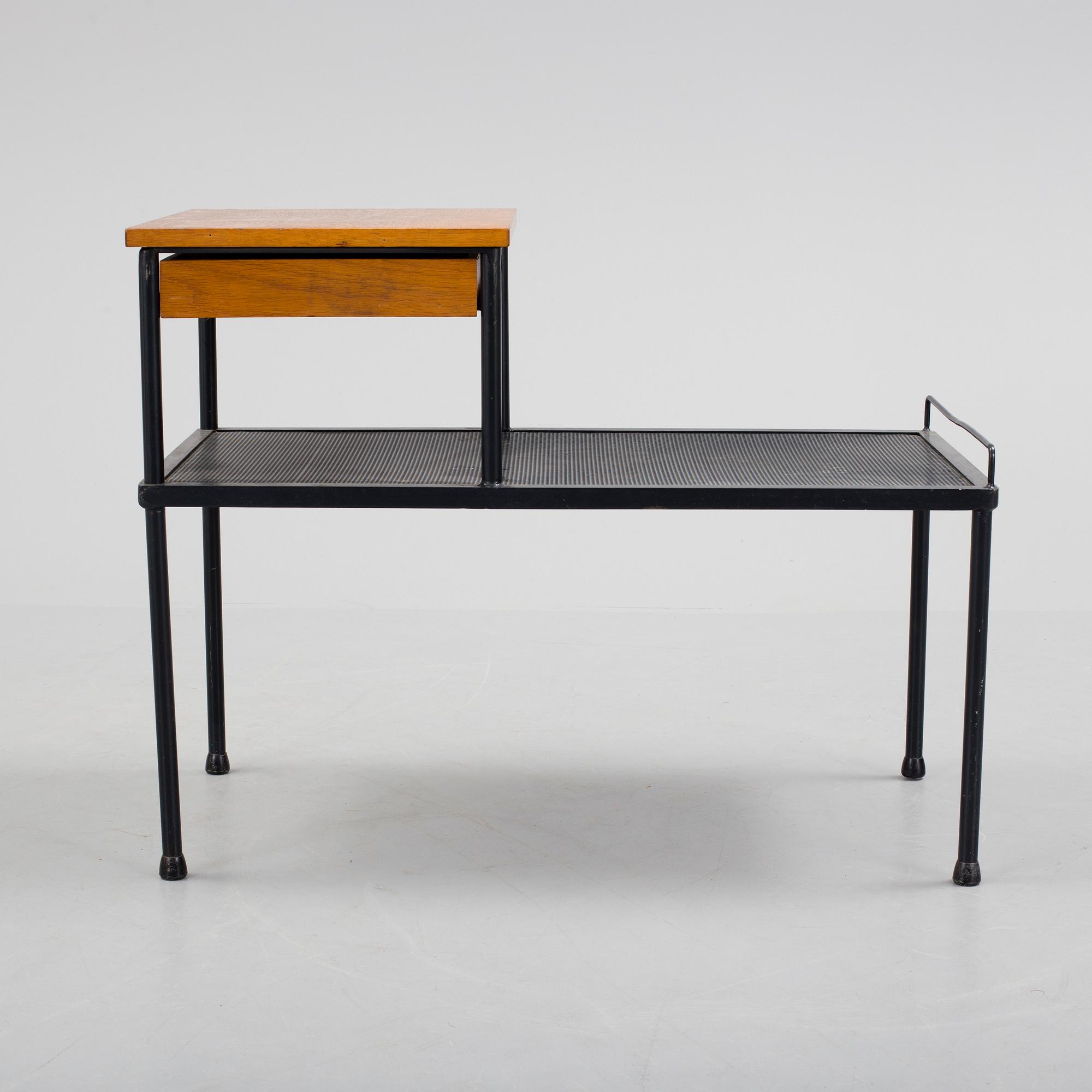 A teak and metal side table, 1950's/60's.