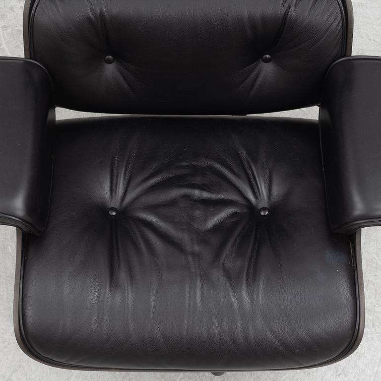 Charles & Ray Eames, an "Eames Lounge Chair" with ottoman, Vitra, 21st century.