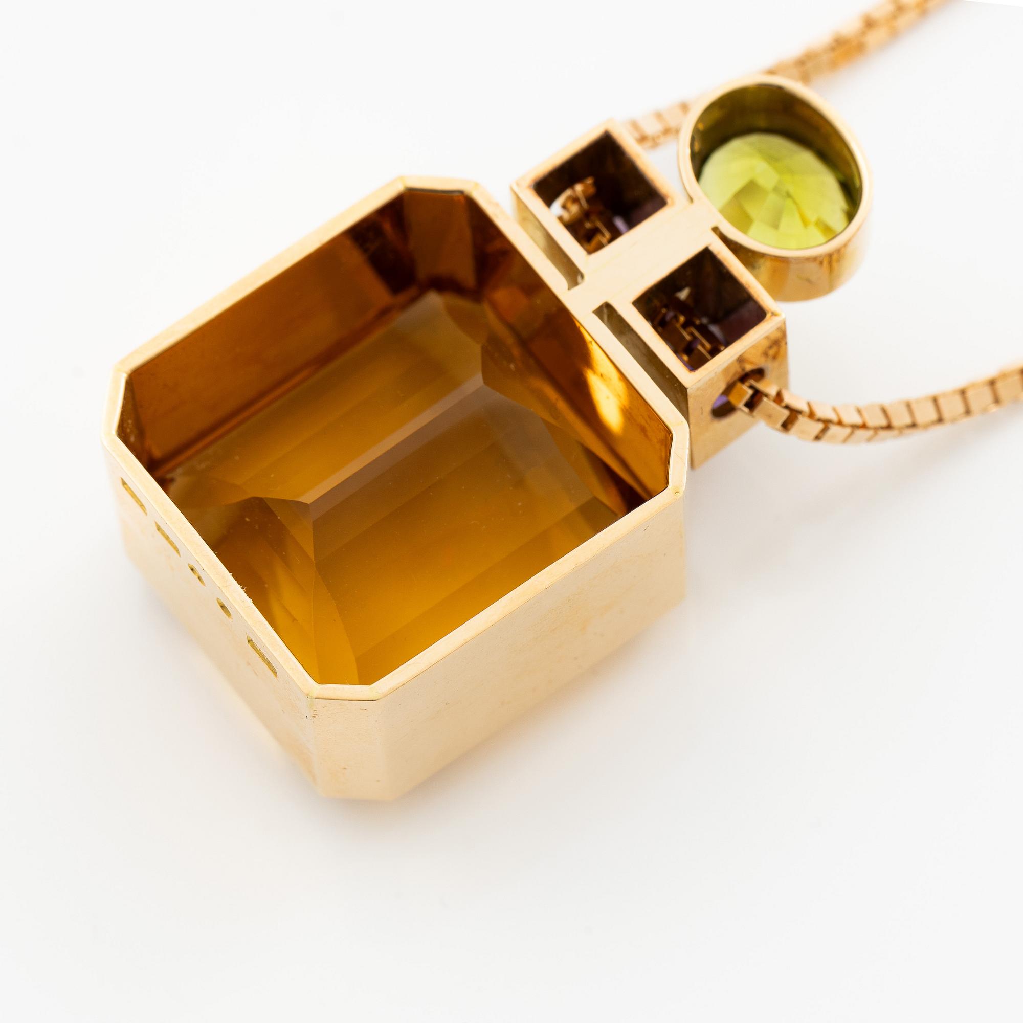 Kristian Nilsson, hänge 18K guld med en fasettslipad citrin, ametist pch peridot. Stockholm, 1986.