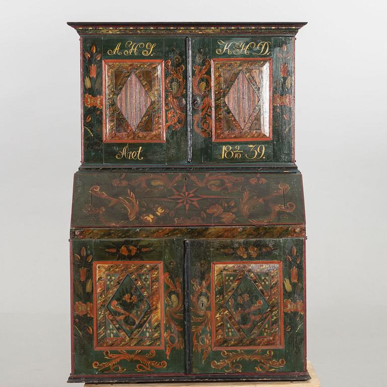 A 19th century cabinet. Dated 1839.