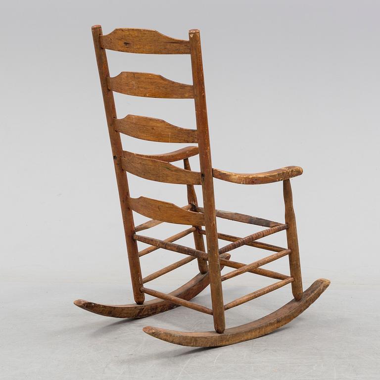 A 18th/19th century rocking chair.