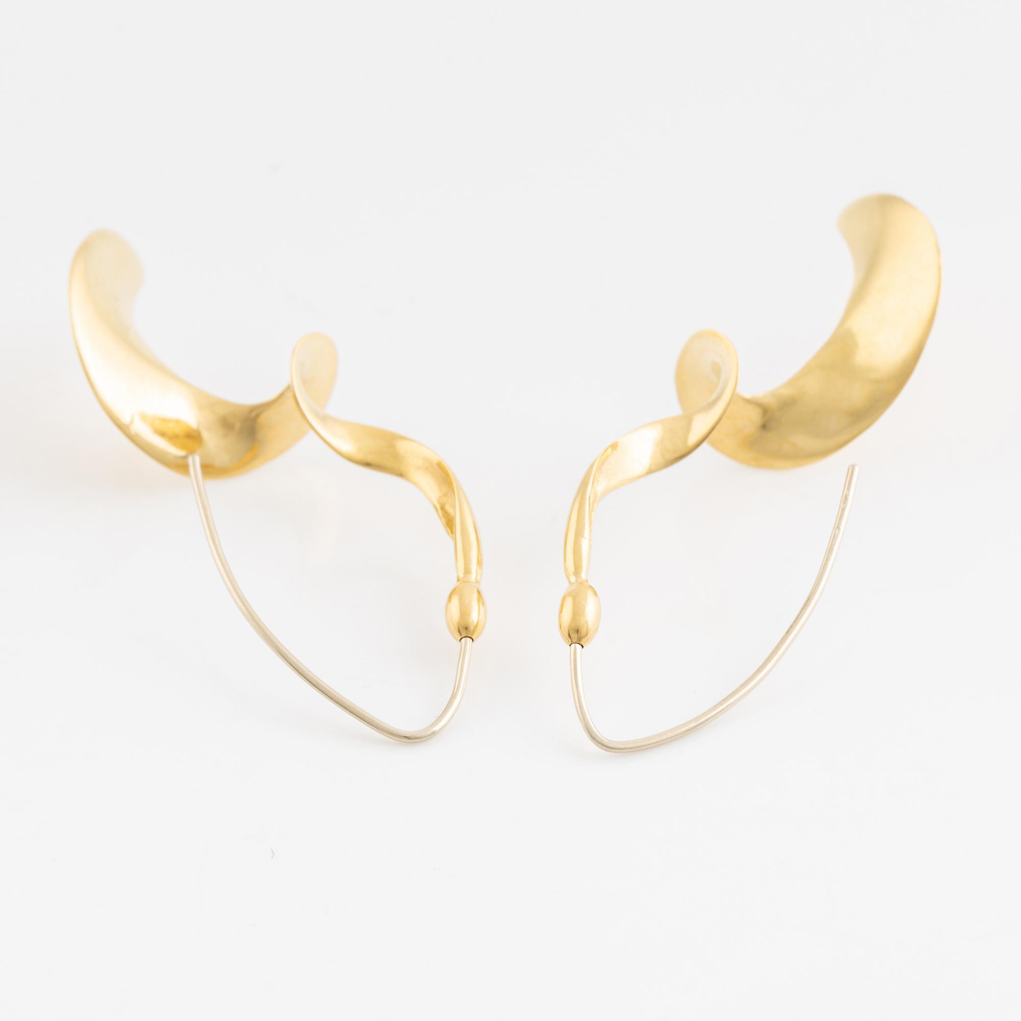 18K gold earrings.