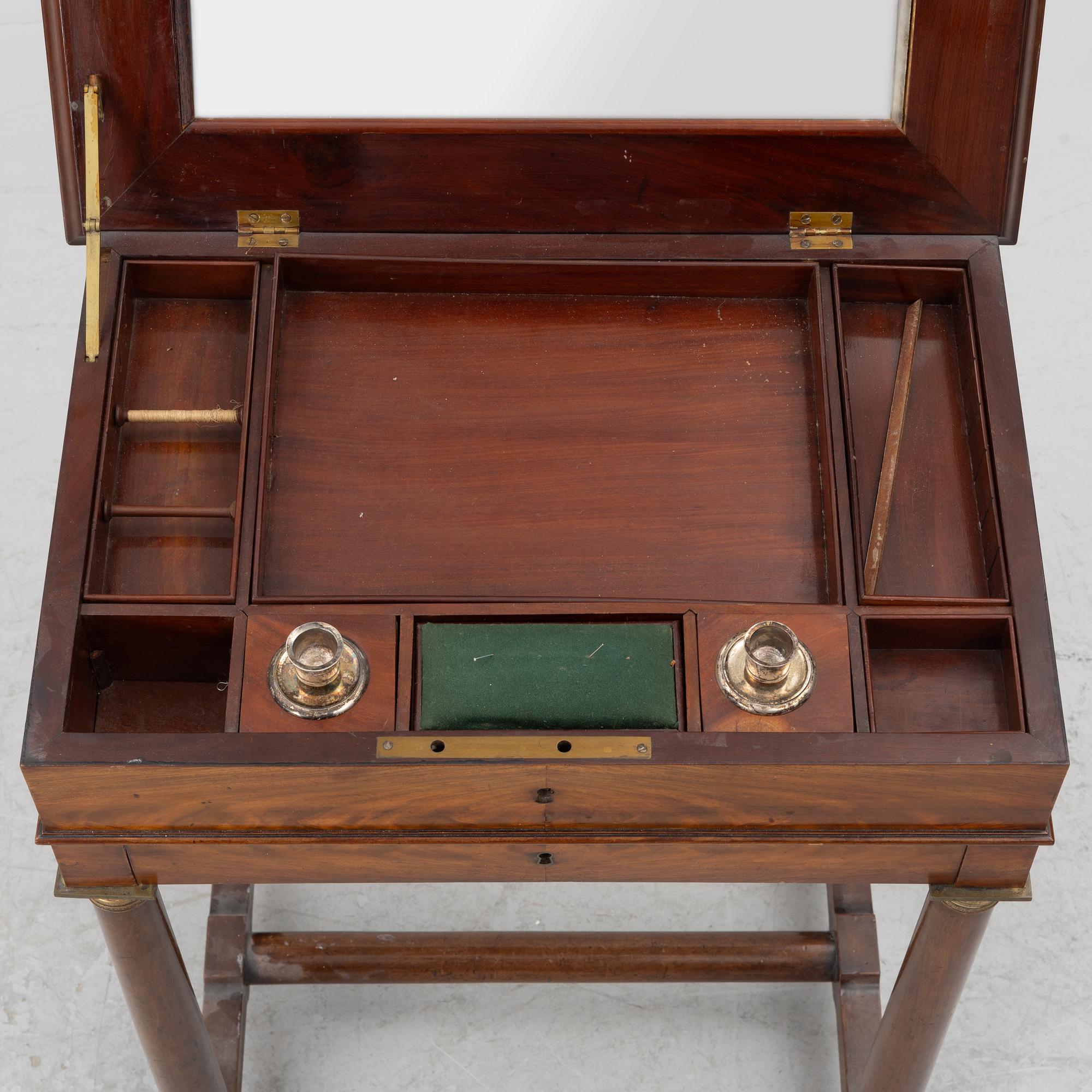 A French Empire mahogany sewing table, first part 19th century.