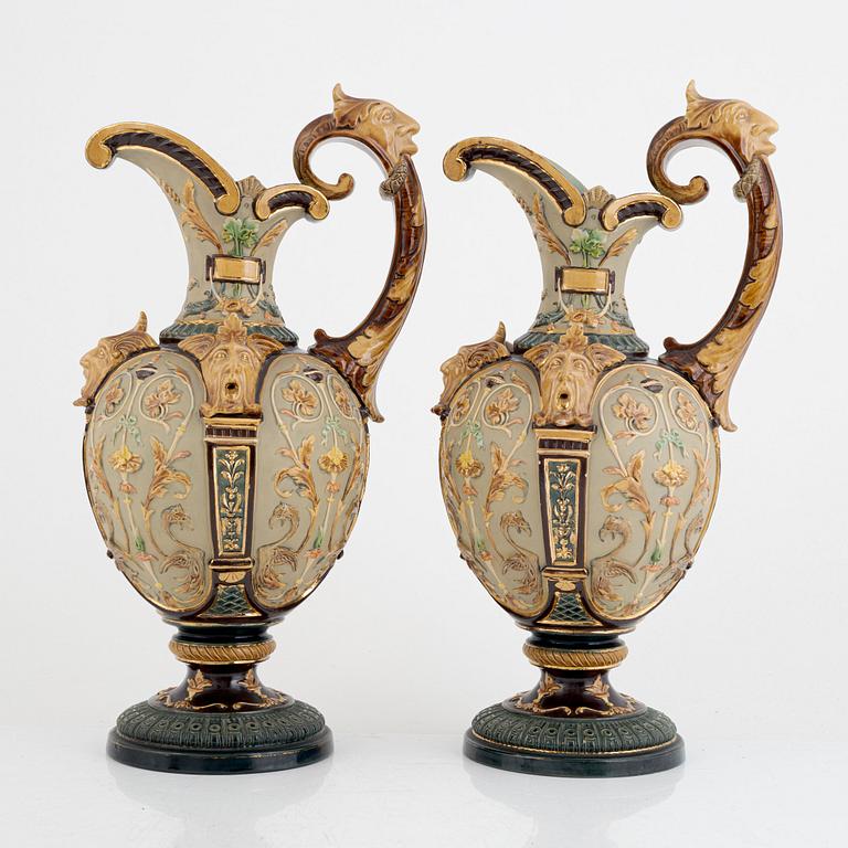 Wilhelm Schiller & Son, a pair of majolica jugs and a jardinier, Austria, early 20th Century.