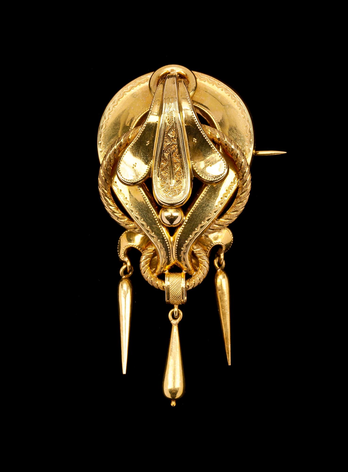 ARMRING SAMT BROSCH, guld 18K, Gustaf Dahlgren & Co, Malmö 1943 resp 1878. Totalvikt ca 24 gram.