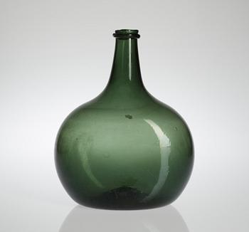 106. A green 18th/19th century bottle.