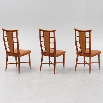Three beech and mahogany chairs, mid 20th Century.