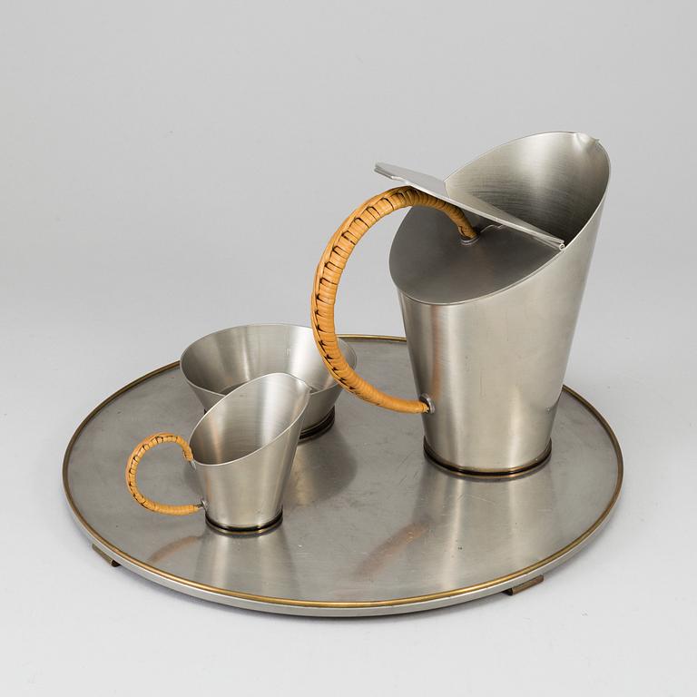 ULLA FOGELKLOU-SKOGH, a pewter four-piece coffee service with brass details, Ystad Tenn, 1930's.