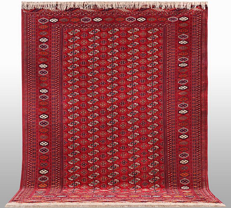A carpet, semi-antique Tekke, ca 330 x 250 cm.