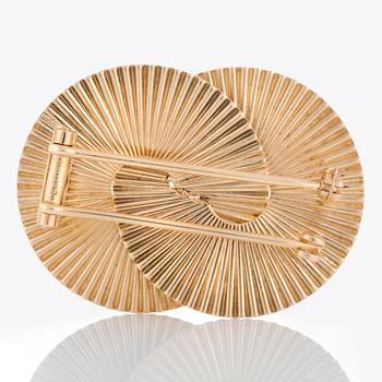 En Cartier Retro brosch.