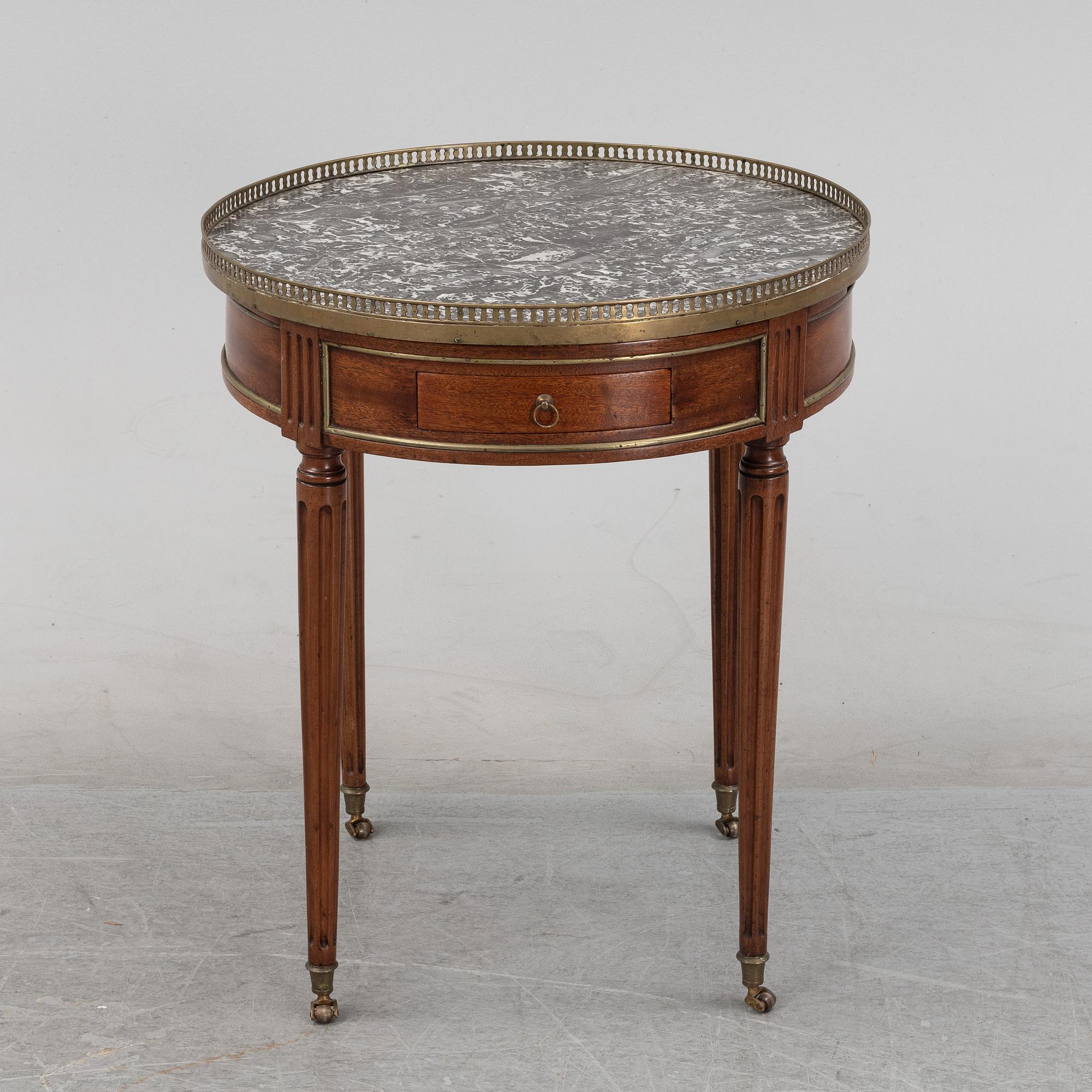 A Louis XVI-style table end of the  19th Century.