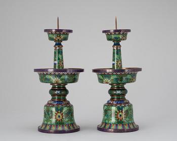 A pair of cloisonné candle sticks, 20th century.