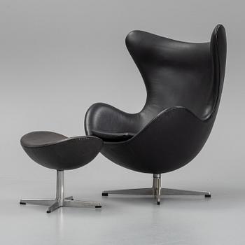 Arne Jacobsen, an 'Egg' swivel chair and ottoman, Fritz Hansen, Denmark.