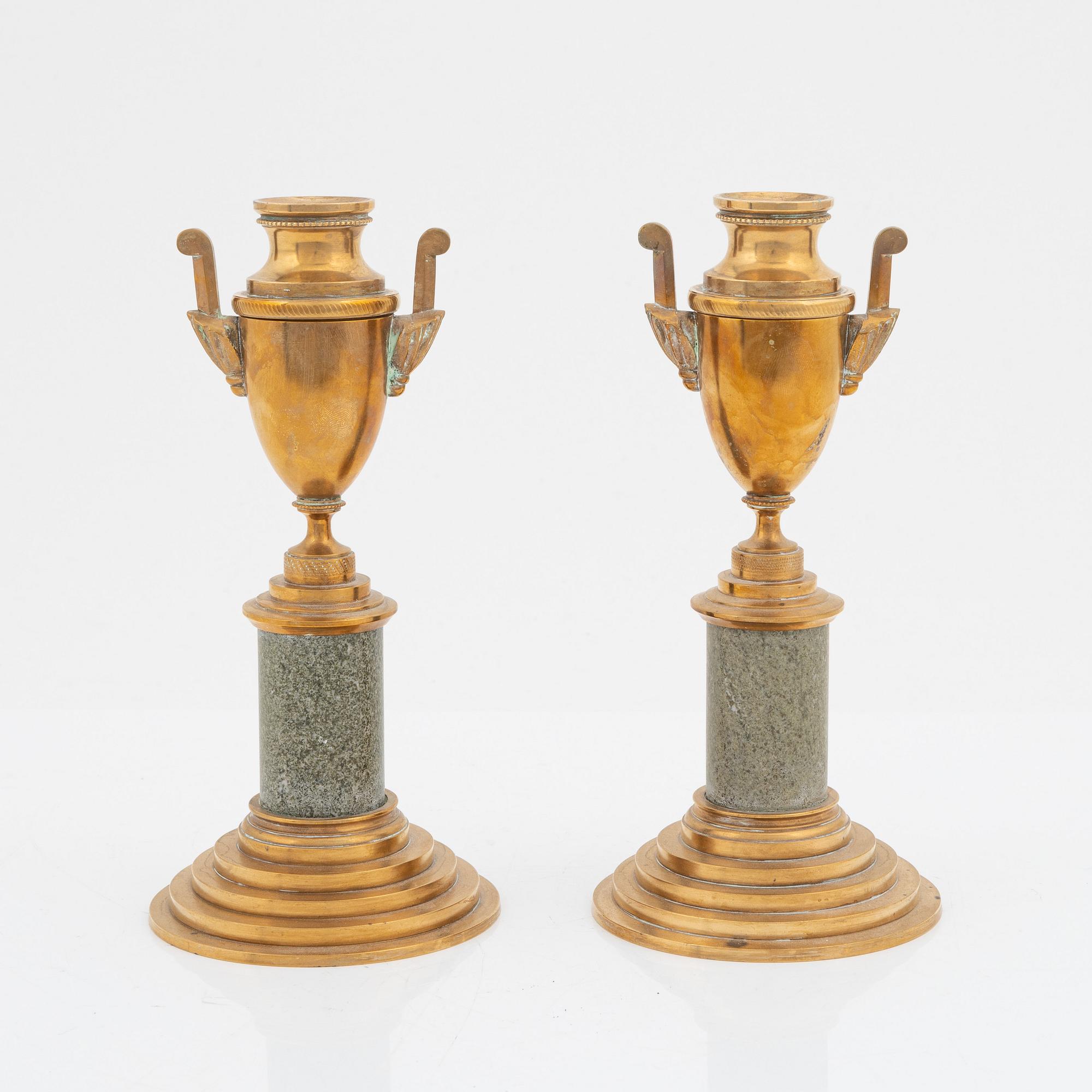 A pair of brass cassolettes from Skultuna Bruk.