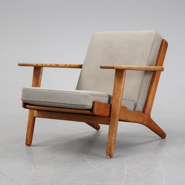 Hans J Wegner, an oak "'GE-290" easy chair from Getama, Denmark.