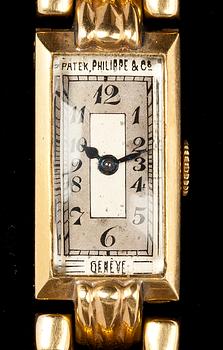 A Patek Philippe ladie's gold wrist watch.
