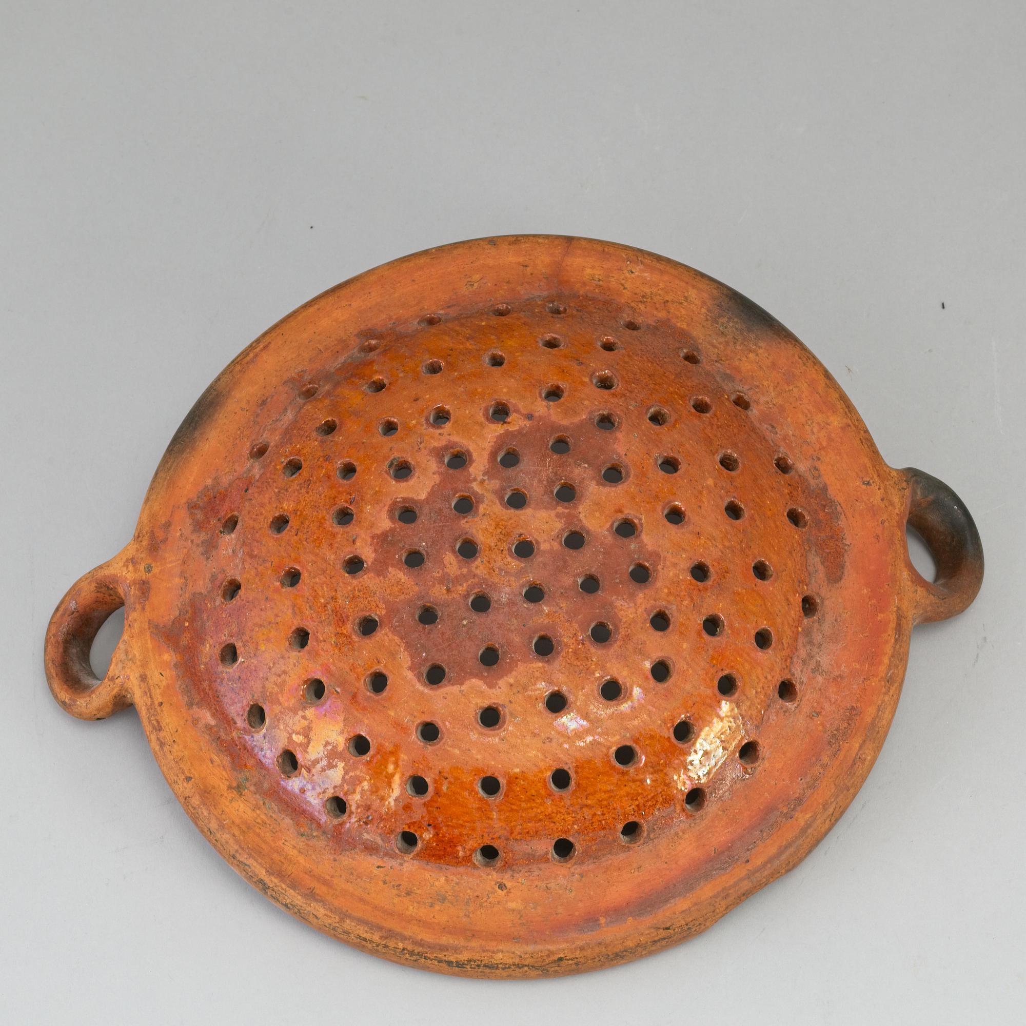 Two pottery strainers, 19th Century, Sweden.