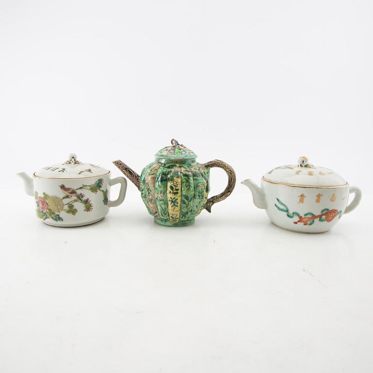A set of three differently decorated tea pots with covers, Qing dynasty, 18century and 20th century.