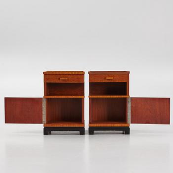 A pair of 1930's bedside tables.