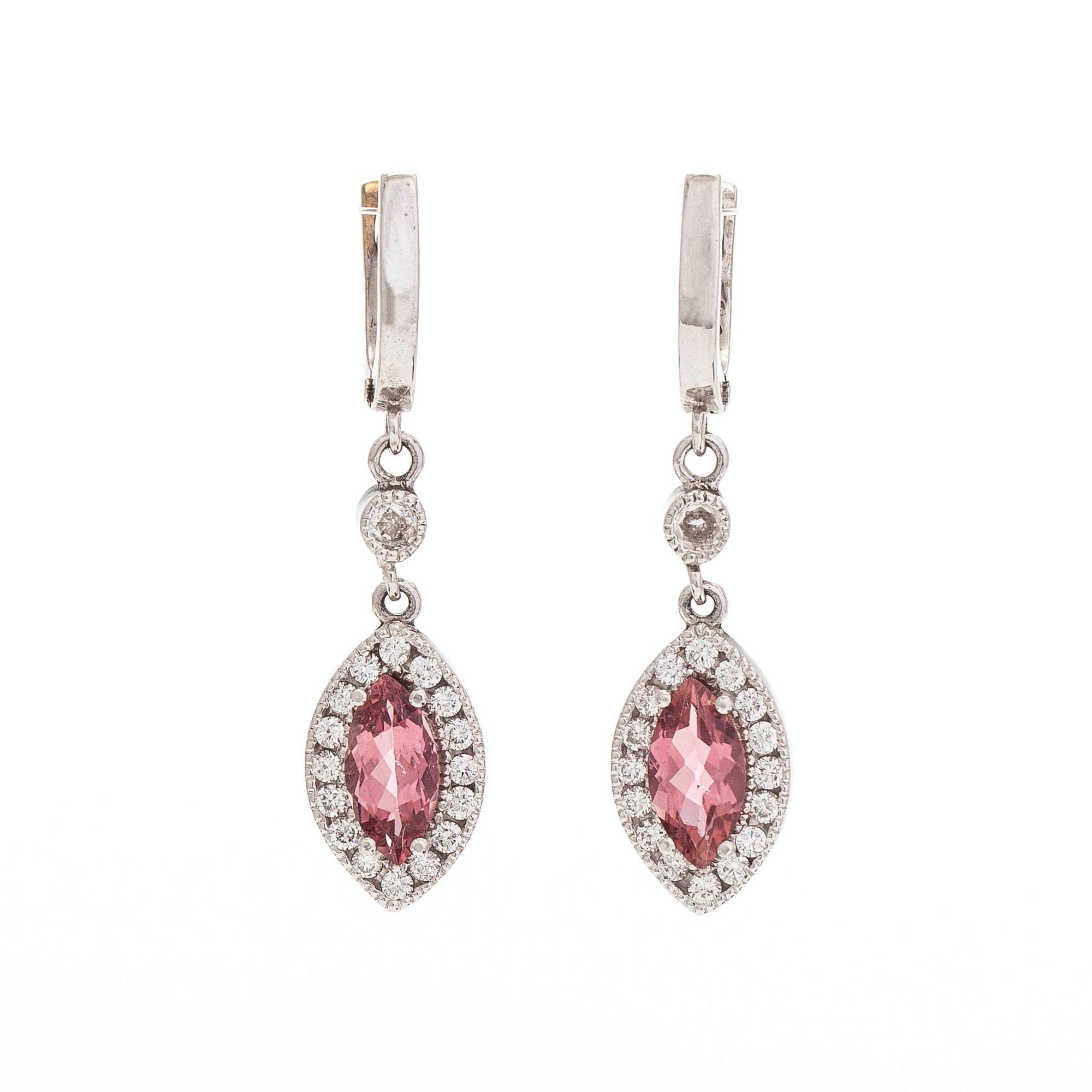 A pair of 14K white gold earrings, set with brilliant-cut diamonds and pink tourmalines.