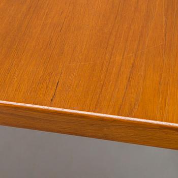 A mid-20th century dining table.