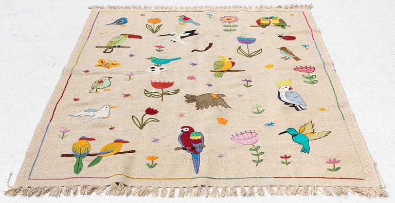 A hand-embroidered Kelim carpet, c. 200 x 145 cm.
