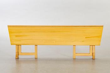 A pine wood gated leg table, design by Olof Pira "Sold Form".