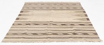 A kilim rug, ca 295 x 196.
