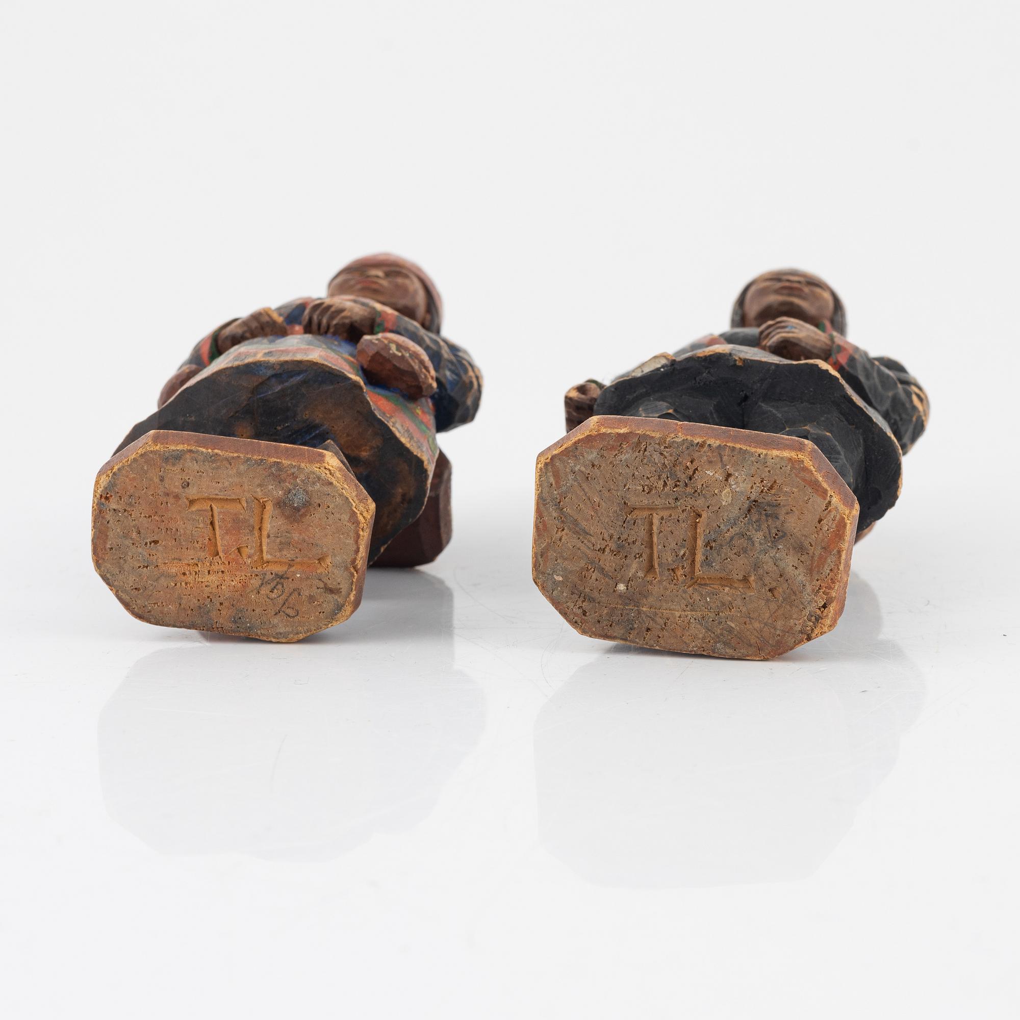 Torborg Lindberg-Karlsson, a pair of figurines, carved and painted wood, signed TL.
