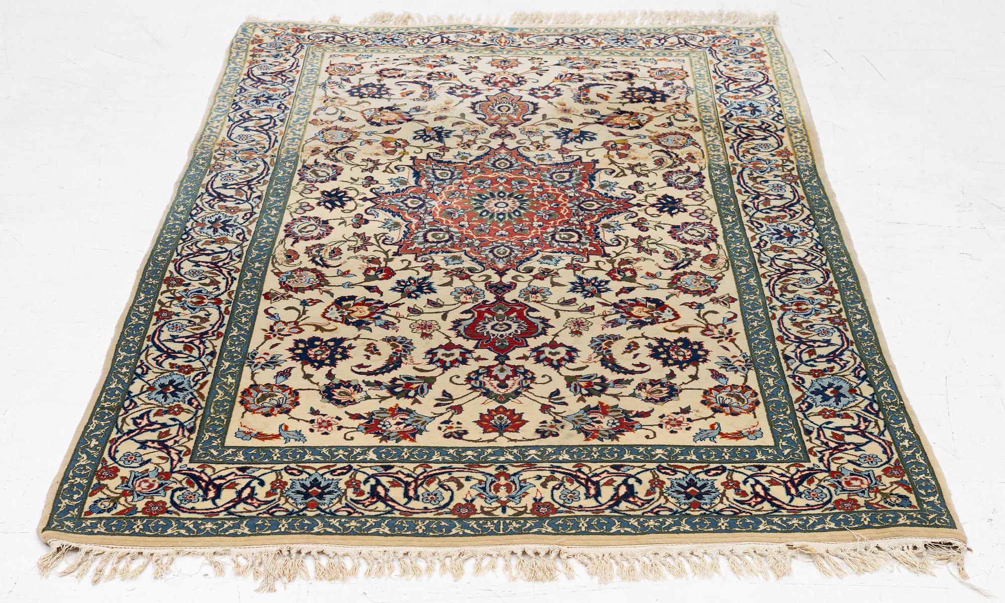 A Nain rug, c. 165 x 103 cm.