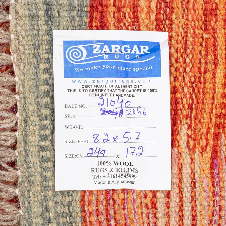 A Kilim rug, c. 249 x 172 cm.