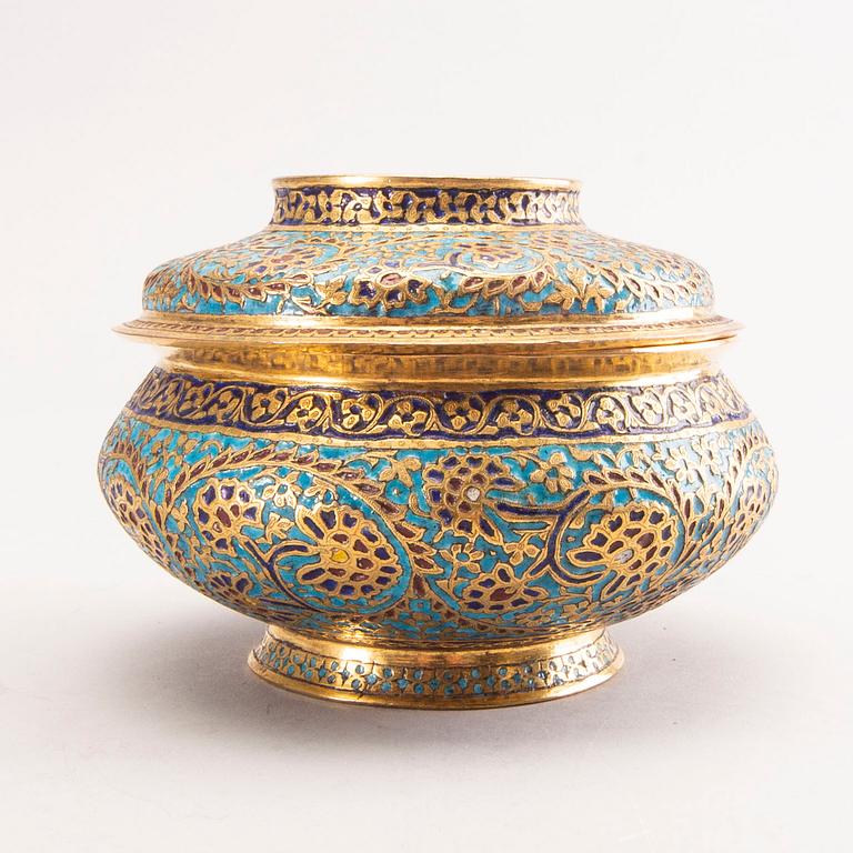 An Indian 19th century gilded jar with lid.