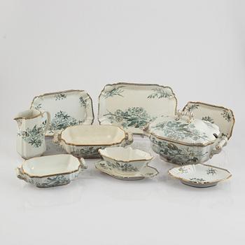 A 124-piece creamware dinner service, "Wexiö guld", Gustavsberg, Sweden, around 1900.