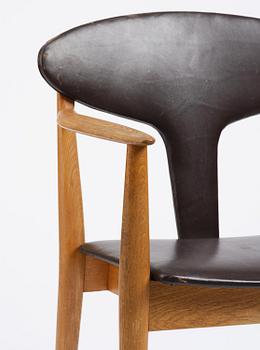 Carl-Axel Acking, attributed, a pair of armchairs, reportedly executed for the municipal council in Åhus, by Åhmans, 1950s.