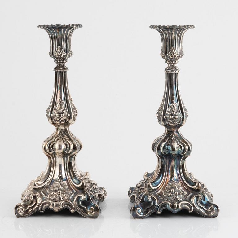A pair of silver plated candelabra, late 19th Century.