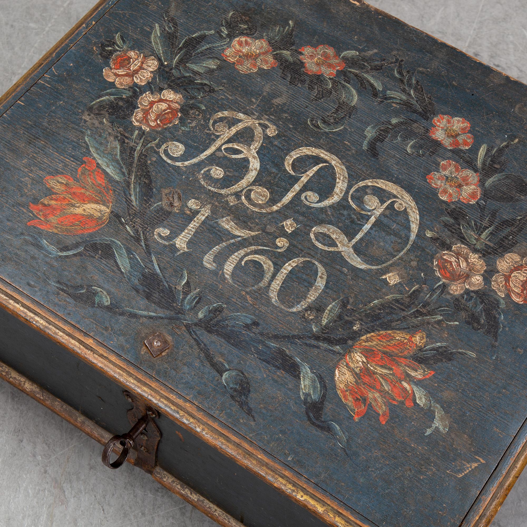 A painted wooden box, marked 1760.