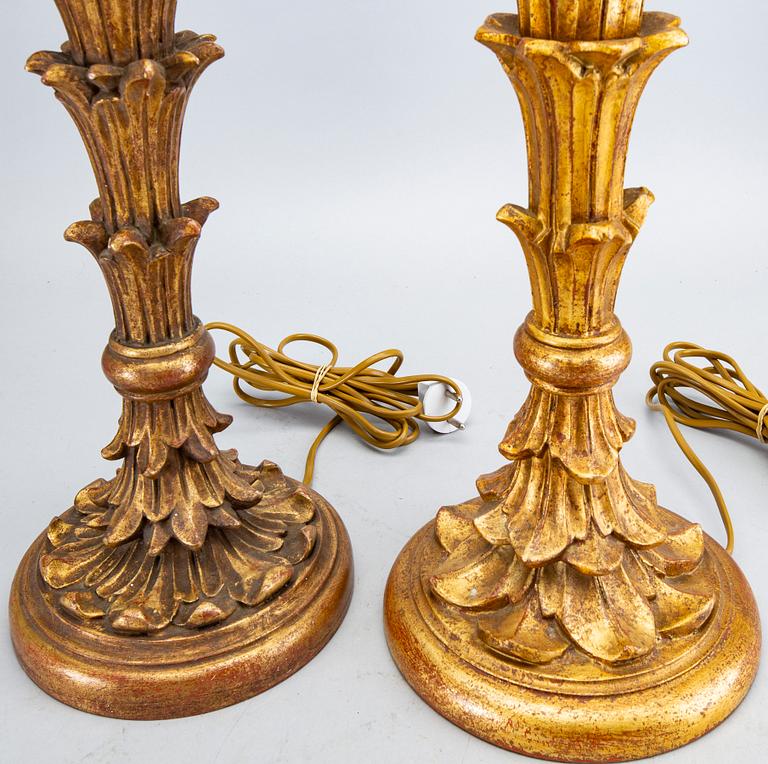 Two mid 20th century wood table lamps from Paoletti, Firenze Italy.
