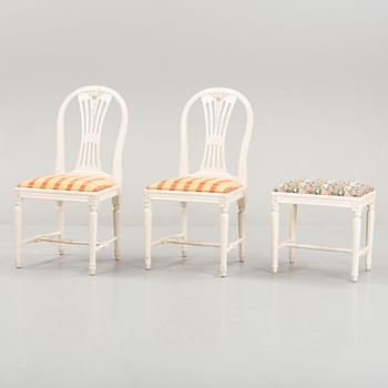 A dining table with eight chairs and a stool, Gustavian style, second half of the 20th Century.