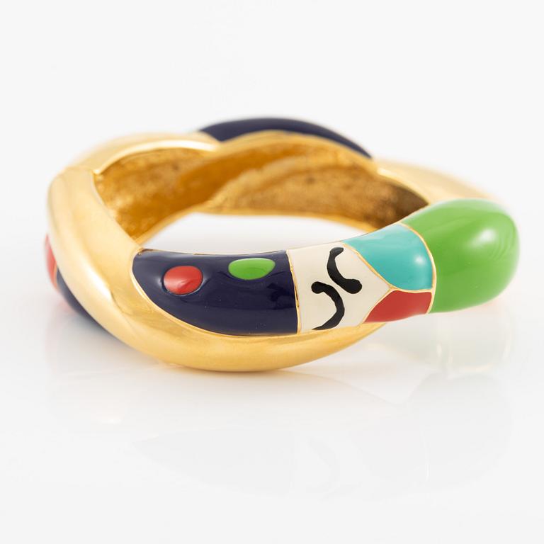 Niki de Saint Phalle ormarmband gul metall med emalj.