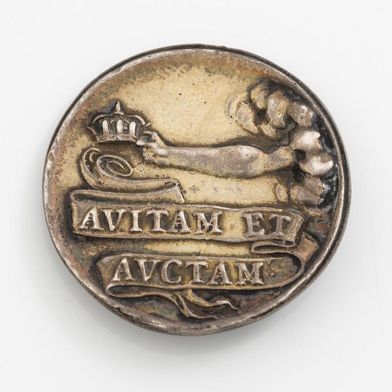 A coin commemorating Christina of Sweden's coronation 1650, by Erich Parise (medal engraver, fl. mid 17th century).