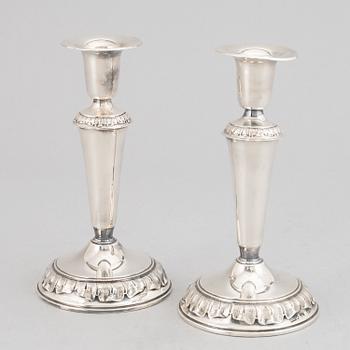 A pair of silver candle holders, GAB, Stockholm 1958.