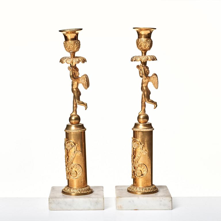 A pair of late Gustavian candlesticks.