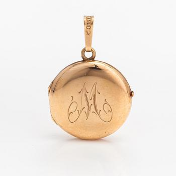 A 14K gold locket. Kulta-tiimi, Turku 1995.