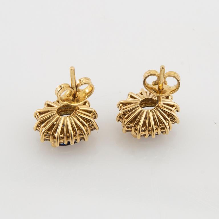 Earrings, a pair of 18K gold set with oval faceted sapphires and round brilliant-cut diamonds.