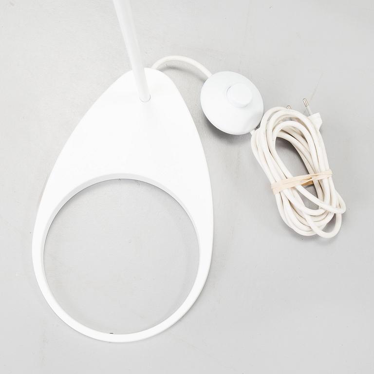 ARNE JACOBSEN, a "AJ" floor light for Louis Poulsen.