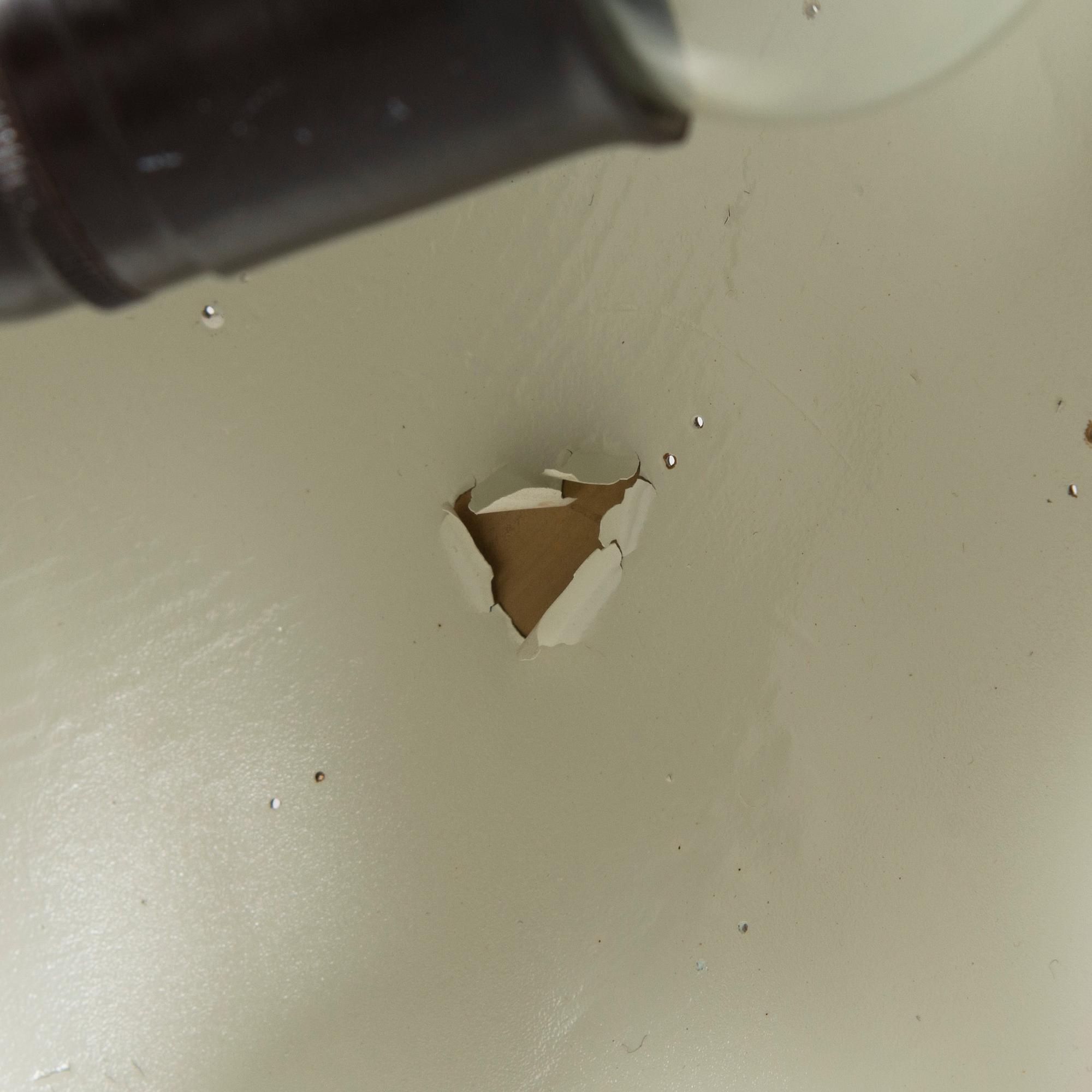 Kattovalaisin, 1900-luvun puoliväli.