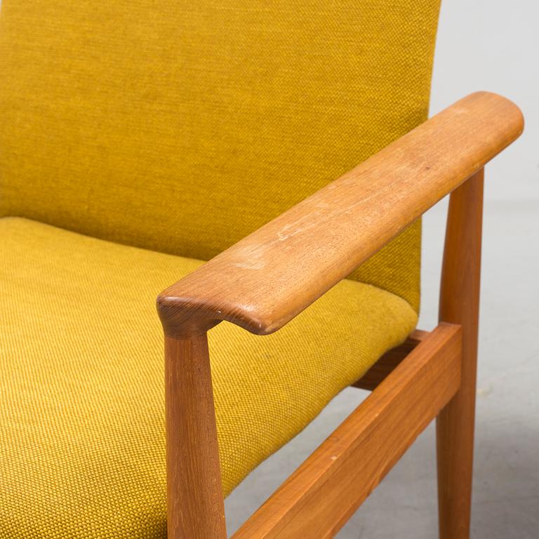 A pair of "Diplomat" easy chairs by Finn Juhl.